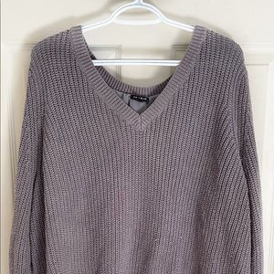 Torrid sweater with sheer underlay and back design